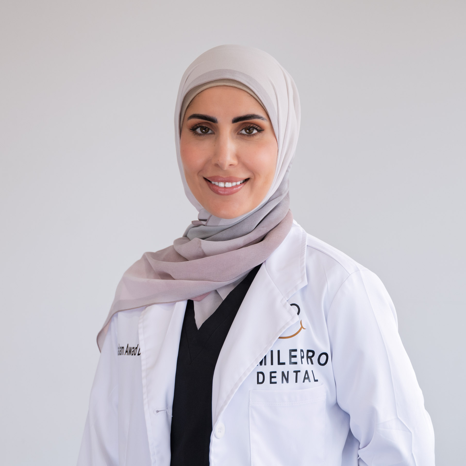 Dr Awad headshot L1030081 - SmilePro Dental